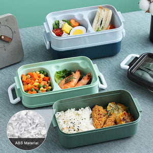 Auslaufsichere Lunchbox mit Fächern und Besteck grün